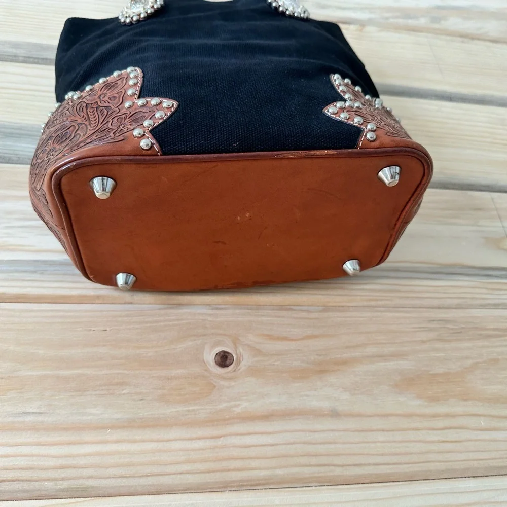 Black and brown western tote with leather acents